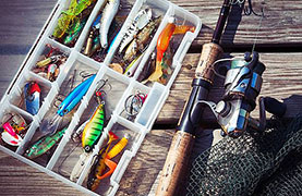 Assorted tackles being shown in a box.