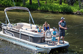 Family enjoying the day out on the pontoon while fishing.